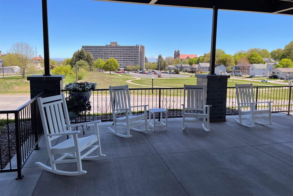 Beacon House outdoor patio with a view of west spring street in marquette michigan.
